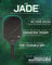 A promotional graphic for the JADE paddle, featuring a black paddle with a green-accented outline on a dark green textured background. The text highlights key features and benefits of the paddle, including 'full foam build', 'no core crush', 'mop floating core', 'sic matrix surface', and 'axial carbon laup'.